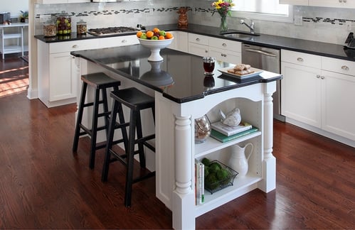 black quartz countertop in white kitchen