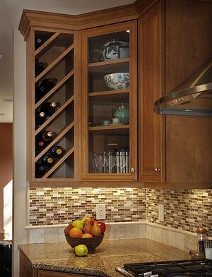 updated kitchen cabinets with wine storage