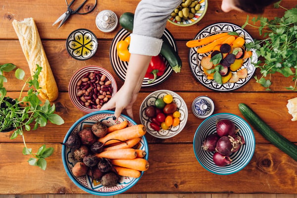 ENV-colorful-vegetables-and-greens-on-a-wooden-table-2026-03-09-22-09-21-utc