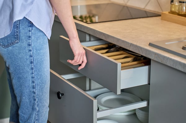 ENV-woman-organized kitchen-drawer-utc