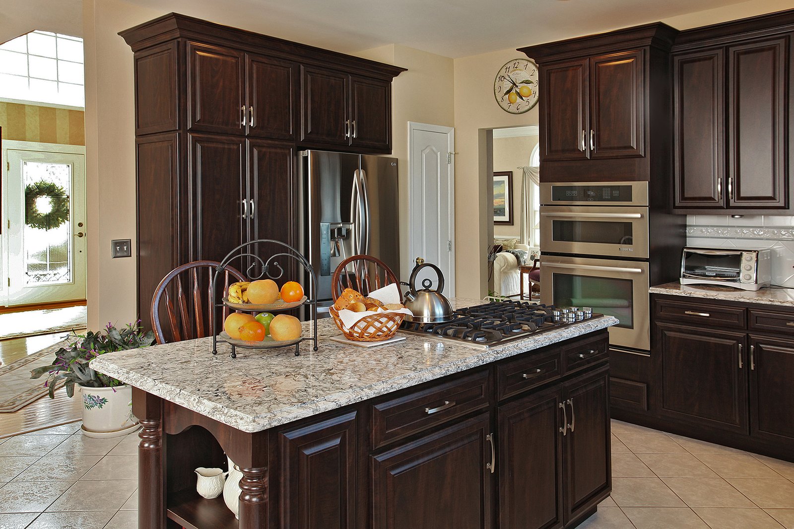cabernet kitchen cabinet with light grantite countertops