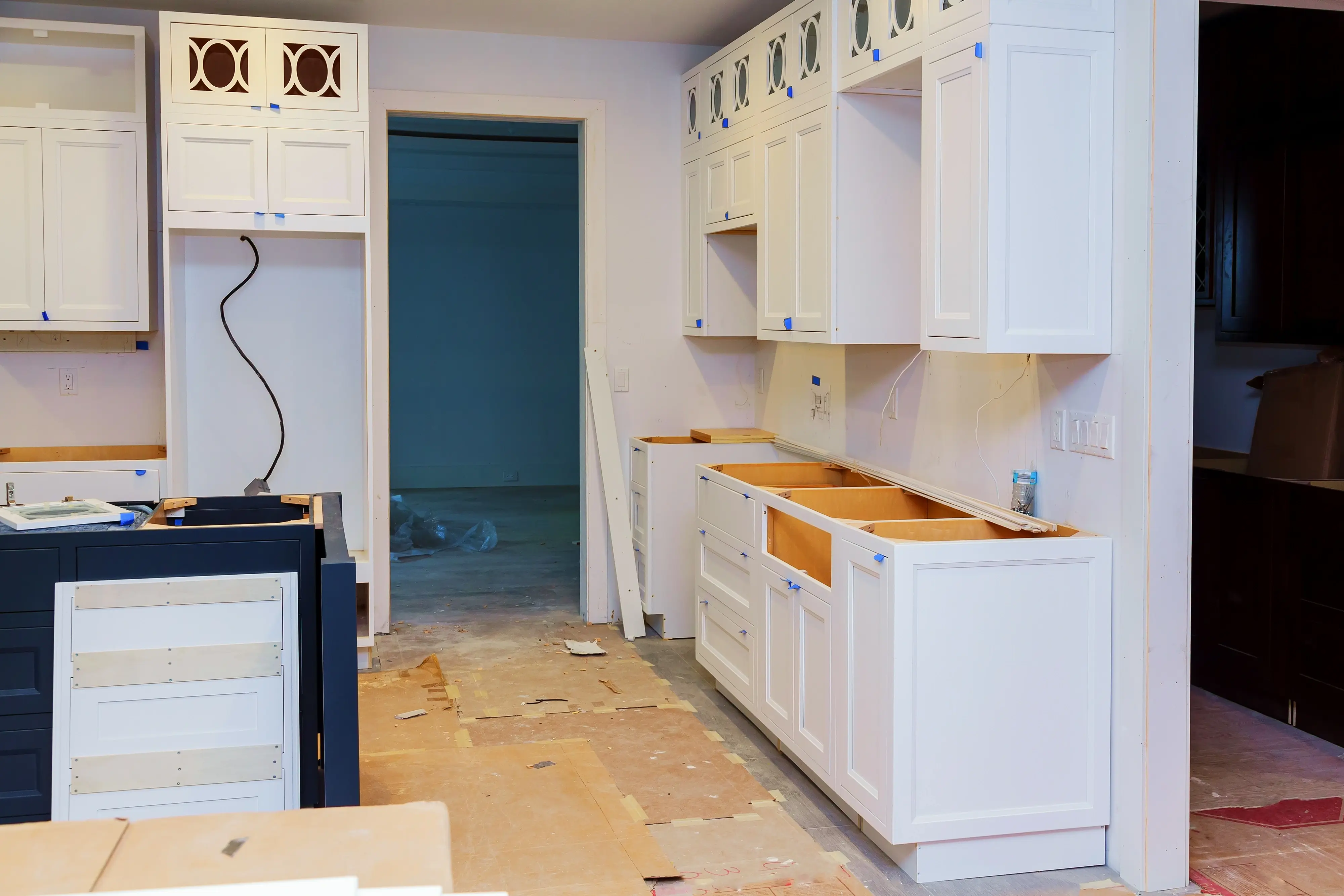 ENV-new-kitchen-cabinets-being-installed-in-modern-hom-2026-03-25-06-38-50-utc