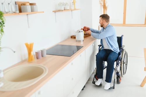 accessible kitchen blog-young disabled man 04.28.25