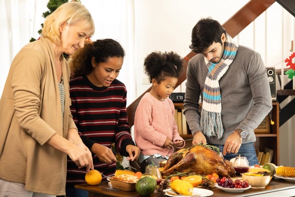 Envato-Thanksgiving family cooking prep 04.22.25
