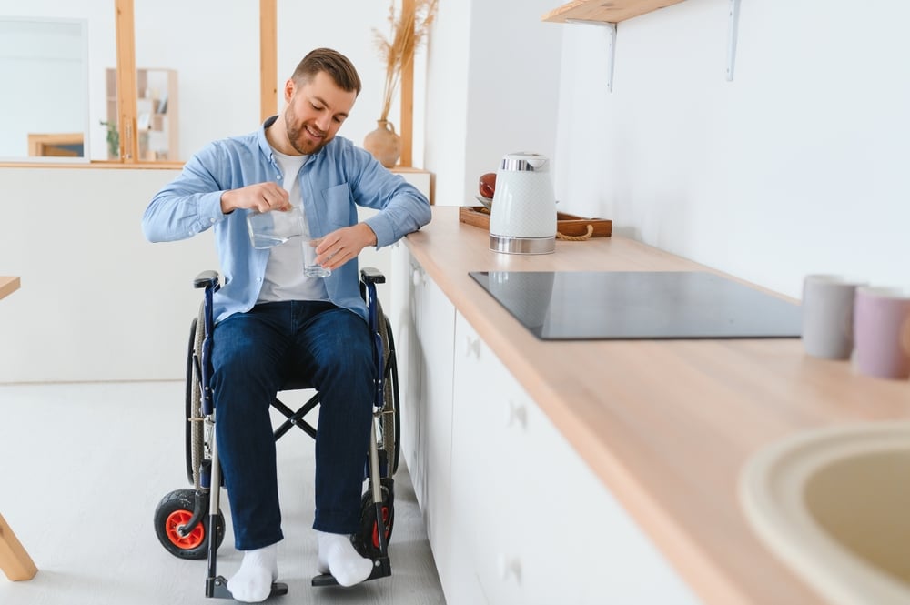 How should an accessible kitchen layout support wheelchair movement