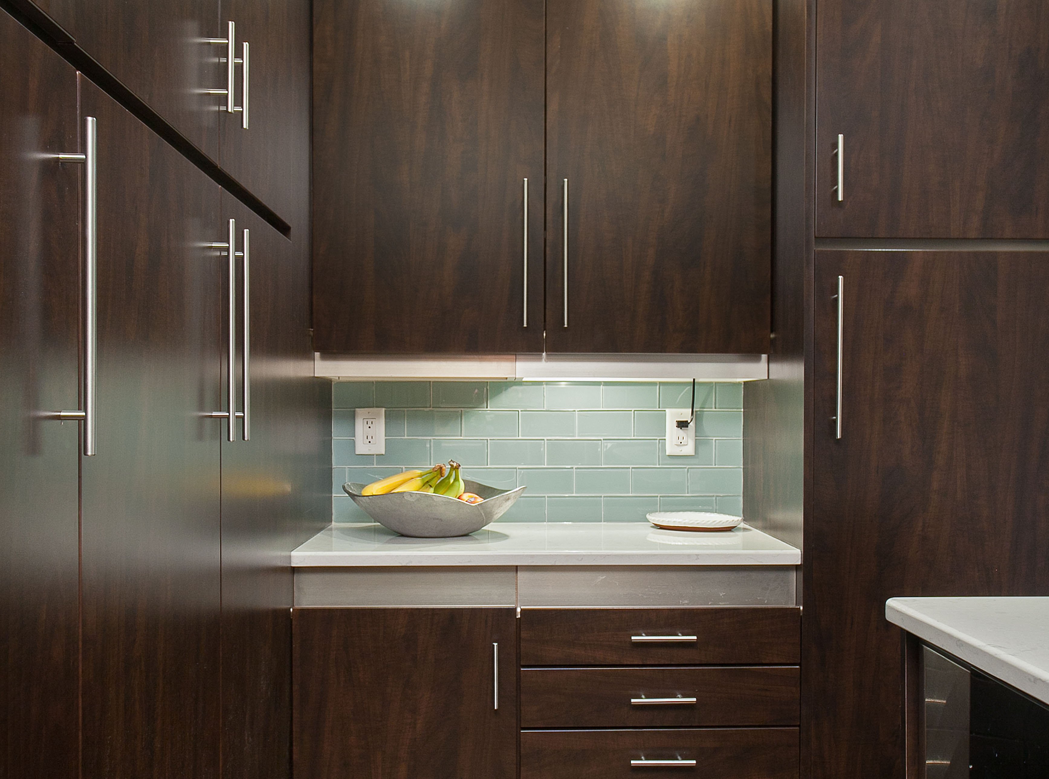 Cherry cabinets and dark wood finishes Kitchen Magic