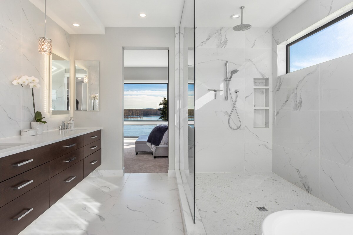 white bathroom featuring white solid surface material