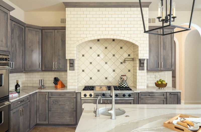 kitchen-earthy-tones-wood-cabinetry-quartz-countertops