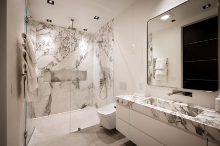 Shutterstock_high-end bathroom marble white_Do Custom Vanities Add Value (ROI and Home Resale Perspective)_12 March 2026.jpeg