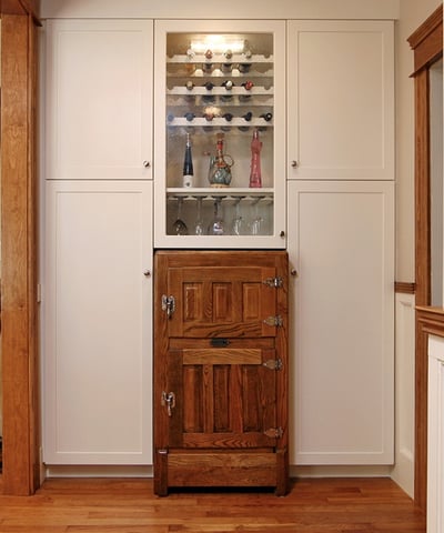 Wooden Antique Ice-Box in a White Cabinet Kitchen