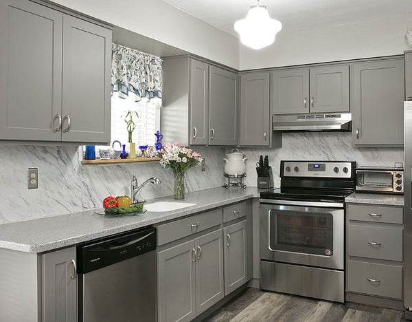 Cool Gray Kitchen Cabinets, Countertop, and Backsplash.