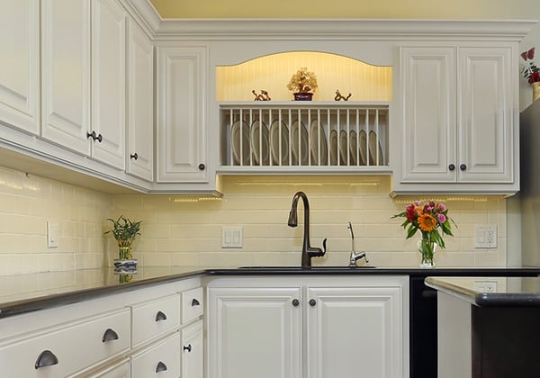 White Kitchen with Dishware Display Rack