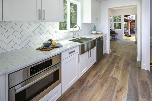 white herringbone kitchen backsplash pattern