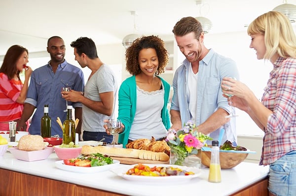 people socializing in the kitchen