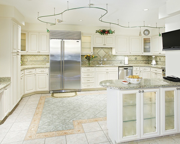 Bright White Kitchen with Stainless Steel Fridge