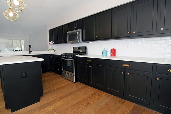 contemporary kitchen with brass hardware