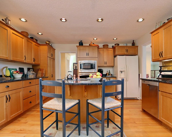 Fruitwood Stain on Maple Wood Kitchen Cabinets by Kitchen Magic