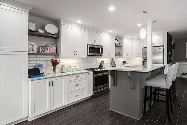 White Kitchen with Shaker Cabinets and Gray Island