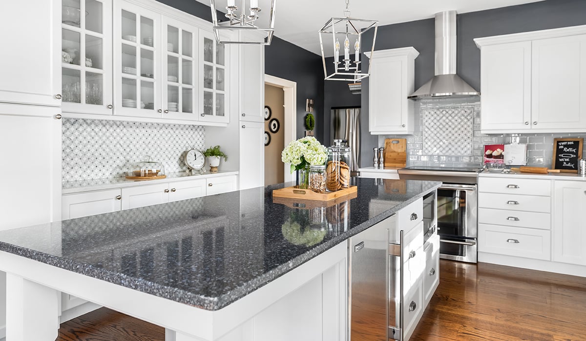 white kitchen cabinets with quartz countertop