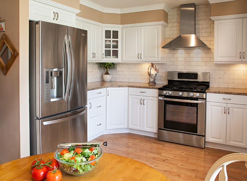 White cabinets with colored doors