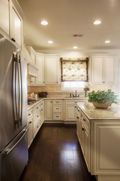 Off white cabinets with black deals countertops